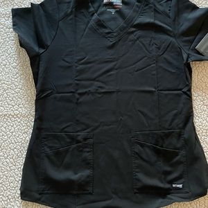 Grey’s anatomy size medium 4pocket scrub top. Brand new